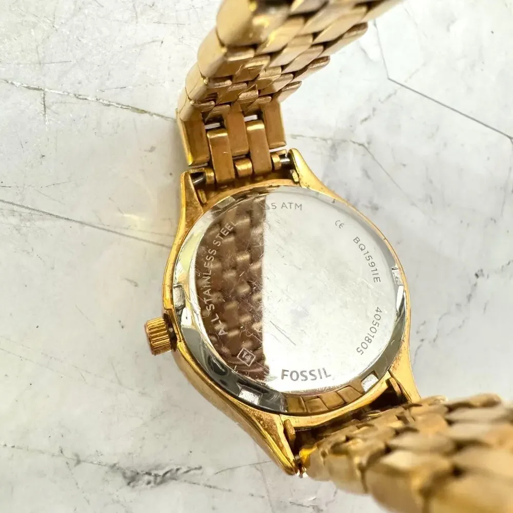 Fossil Women’s Gold Tone Quartz Watch Rose Gold Tone Dial Rhinestone Bracelet